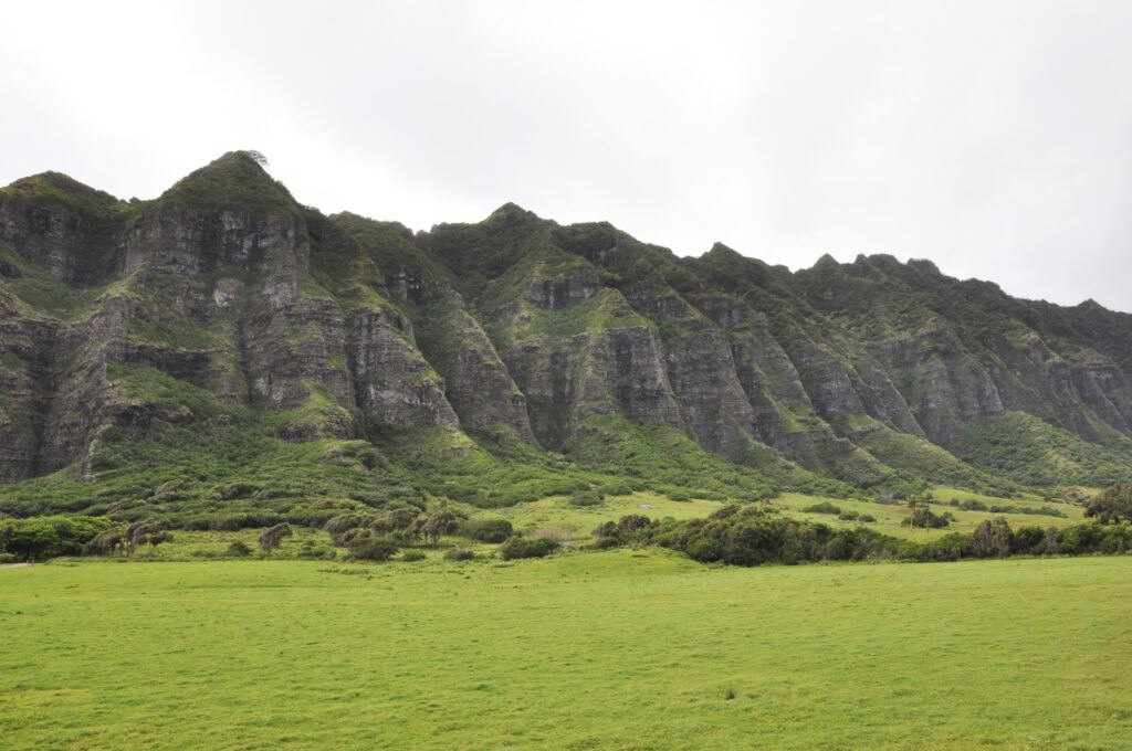 Image of Kualoa Ranch Oahu. North Shore tours often include stops at this iconic location.